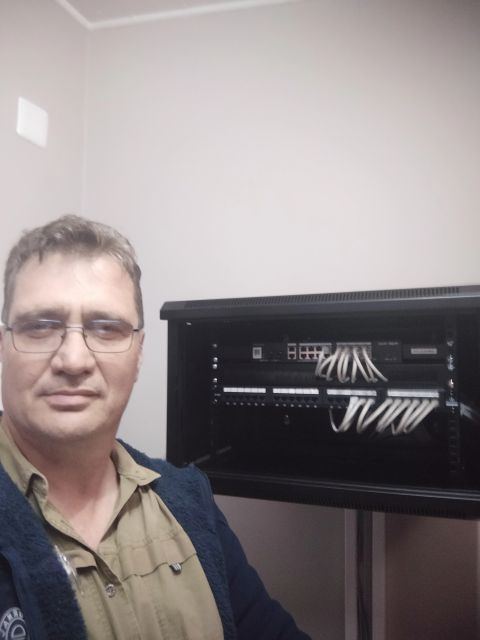 Completed network rack with structured cabling and patch panel
